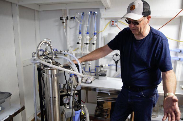 Dan Caldwell at the reverse-osmosis unit in the sugar shack