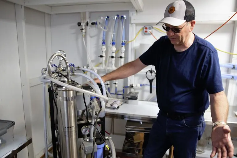 Dan Caldwell at the reverse-osmosis unit in the sugar shack